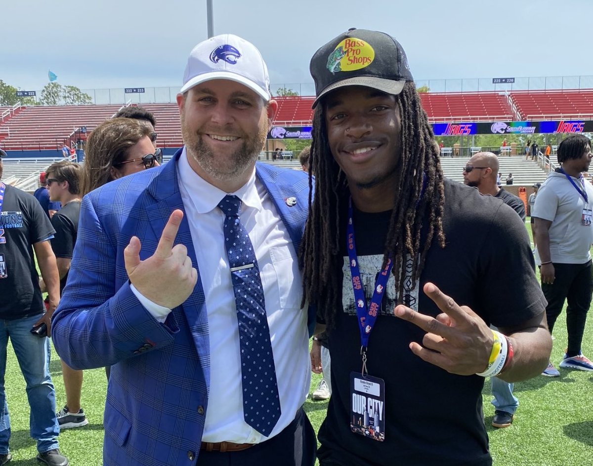 Gulf Shores tailback Ronnie Royal poses for a photo with South Alabama head coach Kane Wommack during an official visit to USA.